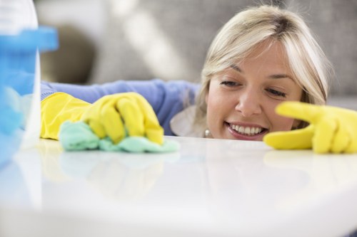 Low-moisture commercial carpet cleaning equipment in use